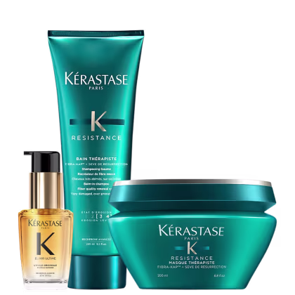 A imagem mostra shampoo e máscara da linha Resistance da marca Kérastase, com frascos em tom azul-esverdeado e óleo capilar Elixir Ultime com frasco transparente, permitindo ver o líquido dourado dentro.