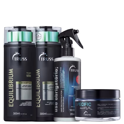 A imagem mostra uma linha de produtos para cabelos da marca TRUSS. Há dois frascos de shampoo e condicionador Equilibrium, um frasco spray preto de 260ml com o rótulo "Uso Obrigatório", um pote com uma máscara de tratamento capilar Specific Mask.