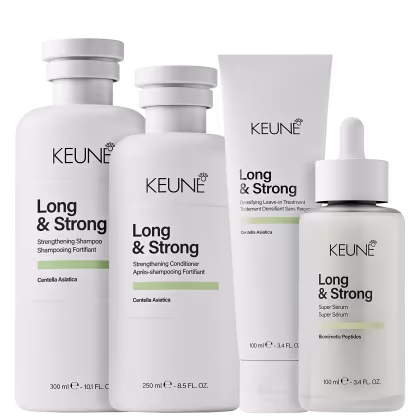 Produtos da linha Long & Strong da Keune, incluindo shampoo, condicionador, tratamento leave-in e sérum, em embalagens brancas com detalhes em verde, destacando ingredientes como Centella Asiática e peptídeos biomimétricos.