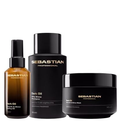 Três produtos da marca Sebastian Professional: um frasco de óleo para cabelos, um frasco de shampoo e um pote de máscara, todos na cor preta com detalhes dourados, exibindo o nome da marca.