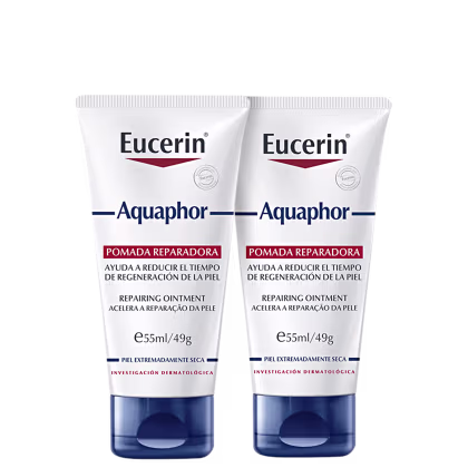 Dois tubos de pomada reparadora Eucerin Aquaphor, com embalagem branca e azul, contendo 55ml/49g cada. O rótulo destaca o nome da marca e o produto "Pomada Reparadora"
