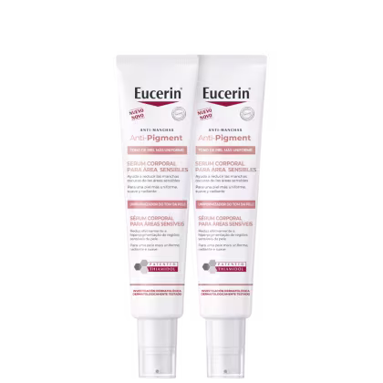 Dois tubos de serum corporal anti-manchas Anti-Pigment da marca Eucerin, de 75ml cada, com embalagem branca e rosa e texto destacando os benefícios do produto para uniformizar o tom da pele.