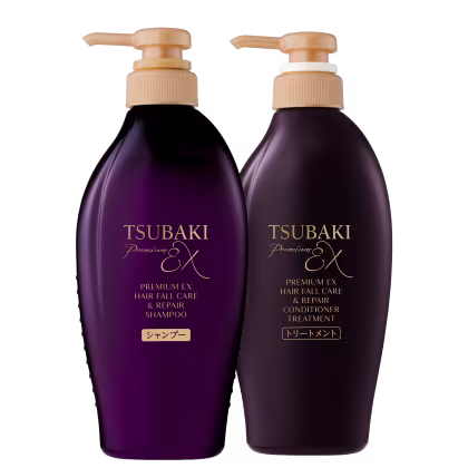 Dois frascos de shampoo e condicionador da linha Tsubaki Premium EX, com embalagens de plástico de cor roxa escura e detalhes dourados, com 250ml cada