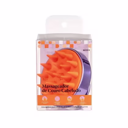A imagem mostra um massageador de couro cabeludo. O produto vem embalado em uma caixa plástica transparente. A embalagem tem um fundo lilás com padrões geométricos alaranjados e brancos. No centro, está o massageador na cor laranja vibrante.