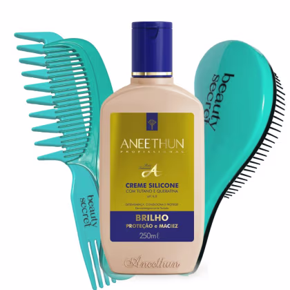 Conjunto de produtos de beleza da marca Aneethun. No centro o creme e ao redor uma escova e dois pentes.