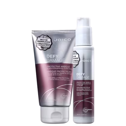 A imagem mostra dois produtos da linha Defy Damage da marca Joico: máscara capilar "Defy Damage Protective Masque" de 150ml em uma embalagem prateada com detalhes em roxo; e leave-in "Defy Damage Protective Shield" em um frasco prata com detalhes em roxo.
