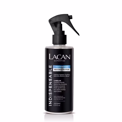 Frasco preto com rótulo da marca Lacan Expertise, contendo um tratamento reconstrutor para cabelos danificados, desvitalizados ou fragilizados por químicas ou danos naturais. Possui um pulverizador preto e contém 260ml do produto.