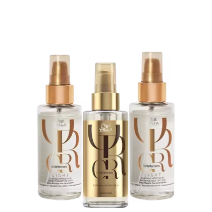 A imagem mostra três frascos de óleo capilar, dois com rótulos brancos e um com rótulo dourado.