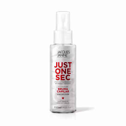 Frasco de spray branco da linha Just One Sec da Jacques Janine Professionnel, com rótulo vermelho destacando o nome do produto e a promessa de "efeito extraordinário em apenas 1 segundo" para todos os tipos de cabelo.