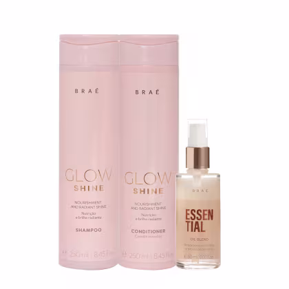 O produto apresentado é uma linha de cuidados capilares da marca Braé. Consiste em dois frascos de 250ml cada, um shampoo e um condicionador, na cor rosa claro. Acompanha também um frasco menor de óleo capilar "Essential Oil Blend".