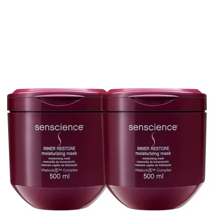 A imagem mostra dois frascos de máscara capilar. Os frascos são de plástico vermelho escuro com tampas da mesma cor. Cada frasco tem capacidade de 500ml.