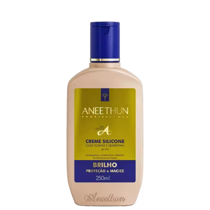 A imagem mostra o frasco do creme capilar, sua embalagem é bege com detalhes na cor azul e dourada.