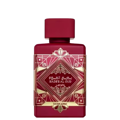 Frasco de perfume da marca Lattafa Perfumes, com o nome "Bade'al Oud" e a designação "Sublime" impressos no rótulo. A embalagem é de cor vermelha predominante, com detalhes decorativos em dourado, apresentando um design geométrico e ornamental.