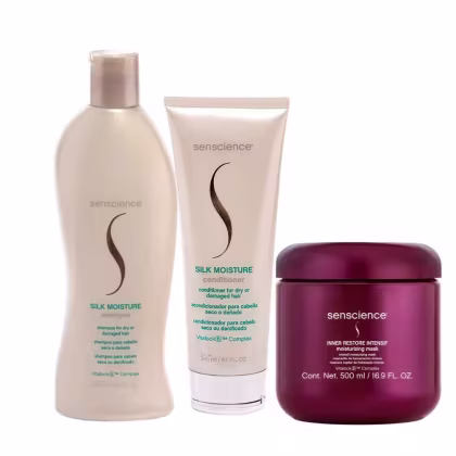 Um frasco de shampoo, um tubo de condicionador e um pote de máscara capilar.