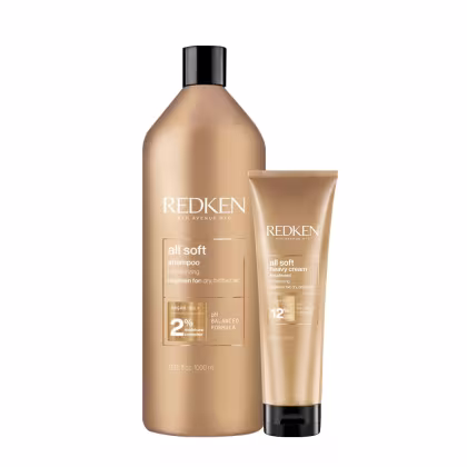 Conjunto de produtos de cuidados capilares da marca Redken, incluindo um frasco de shampoo 1 litro e um tubo de creme de tratamento para cabelos secos e quebradiços. 