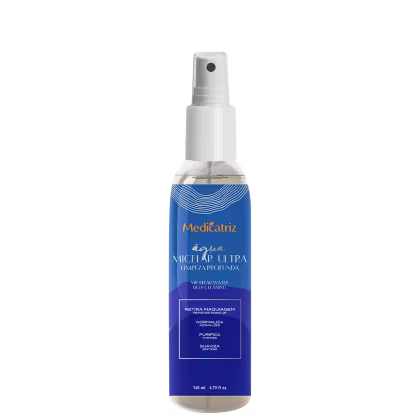 Frasco de spray da linha Água Micelar Ultra da Medicatriz, com design azul e branco, indicando limpeza profunda e remoção de maquiagem.