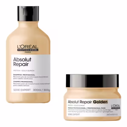 A imagem mostra dois produtos de cuidados capilares da linha L'Oréal Professionnel Série Expert Absolut Repair. Um é um shampoo em um frasco plástico bege, contendo 300ml. O outro é uma máscara capilar chamada "Absolut Repair Golden", com 250ml.
