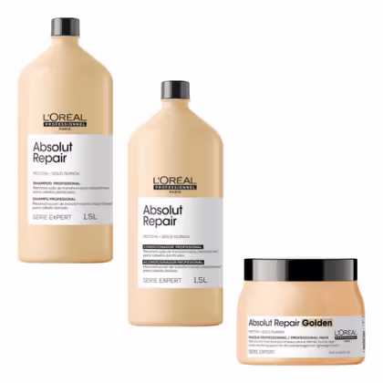 A imagem mostra três produtos da linha Absolut Repair da L'Oréal Professionnel. Dois frascos de 1,5 litros de shampoo e condicionador com proteína e quinoa dourada. Um terceiro produto é uma máscara profissional em um pote plástico bege com tampa preta.