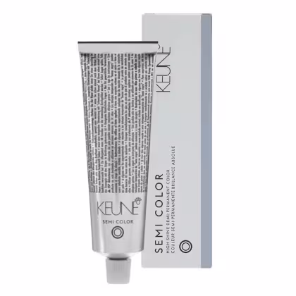 Tubo de tinta para cabelo da marca Keune, na cor cinza, com rótulo em branco e preto. A embalagem possui um design minimalista e moderno, com a marca Keune destacada.