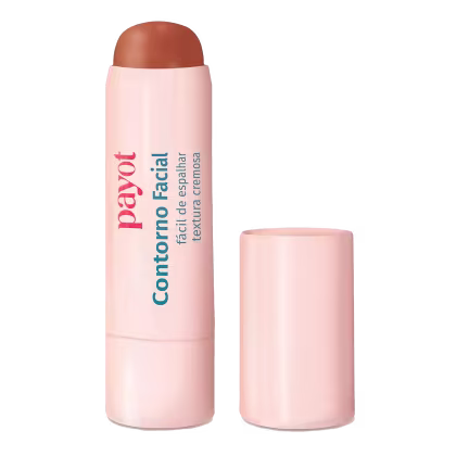 Imagem de um bastão ou de cor salmão claro, sem tampa. Rótulo com o nome da marca "Payot" em letras grandes e vermelhas, e "Contorno Facial" em letras menores azuis e pretas. Ao lado, a tampa do bastão. Apresenta contorno facial de cor clara.