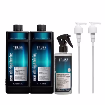 A imagem mostra 3 produtos da linha Uso Obrigatório: shampoo e condicionador de 1L e fluido de tratamento em spray de 260ml. Todos possuem embalagem preta com detalhes em azul escuro no rótulo. Ao lado, duas válvulas pump que acompanham o kit.