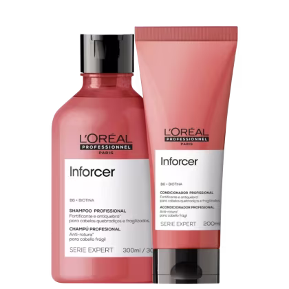 A imagem mostra um kit com 2 produtos da linha Inforcer de L'Oréal Professionnel, sendo um shampoo cilíndrico e um frasco tubular. Ambos na cor vermelha.