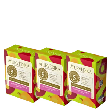 três caixas de sabonete sólido da marca Ayurvedika. O texto indica que se trata de um sabonete vegetal com ingredientes ayurvédicos, como bergamota, hibisco e lótus. Cada caixa contém 120g do produto.