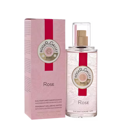 Frasco de perfume da marca Roger & Gallet, com embalagem rosa e vermelha, contendo o nome "Rose" e o logotipo da marca. O produto é descrito como uma "Eau Parfumée Bienfaisante", ou seja, uma água de perfume benéfica.
