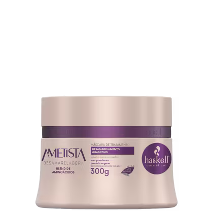 Máscara de tratamento capilar da linha Ametista da marca Haskell Cosméticos. A embalagem é um pote plástico de cor bege com detalhes em roxo, contendo 300g do produto.