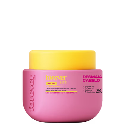 Embalagem rosa com rótulo amarelo da máscara capilar Forever Liss, com informações sobre os ingredientes e benefícios para cabelos ressecados e desidratados.