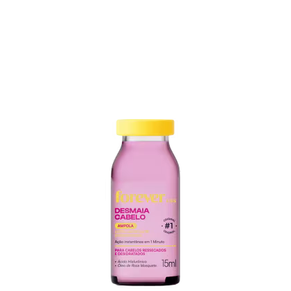 Frasco de 15ml da ampola Desmaia Cabelo da marca Forever Liss, com fórmula para cabelos ressecados e desidratados, contendo ácido hialurônico e óleo de rosa mosqueta, com tampa amarela e rótulo rosa.