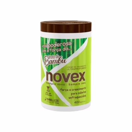 A imagem mostra o creme de tratamento "Broto de Bambu" 400g da marca Novex. Traz a informação de força e crescimento para cabelos enfraquecidos. O pote é cilíndrico, na cor verde e branca.