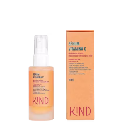 A imagem mostra um frasco pequeno, transparente, fosco, spray, com tampa transparente e rótulo laranja com letras pretas e rosa, indicando tipo de produto, seus ativos e a marca. Ao lado, a caixa retangular com a mesma informação do rótulo do produto.