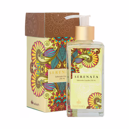 Frasco de sabonete líquido Serenata da marca Kailash, com embalagem decorada com padrões florais coloridos e vibrantes em tons de amarelo, laranja e azul. O produto é apresentado em uma caixa com o mesmo design.