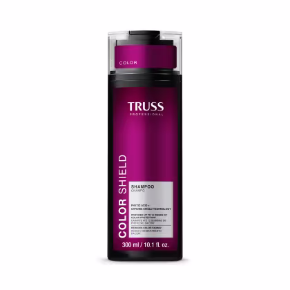Frasco de shampoo da marca Truss Professional, na cor rosa escuro, com rótulo destacando o nome da marca e a tecnologia de proteção de cor.