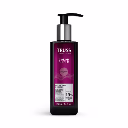 Frasco de 250 ml da linha Color Shield da Truss Professional, com bomba dosadora preta. Rótulo em tom de roxo com o nome da linha e informações sobre o produto, que é um ativador de brilho e proteção de cor para cabelos.