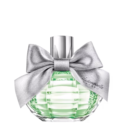 Frasco de perfume Azzaro com laço prateado, contendo líquido verde claro, embalado em recipiente de vidro facetado com tampa metálica.
