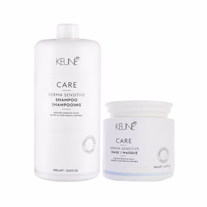 Dois produtos de cuidados com os cabelos da marca Keune Care: um frasco de shampoo Derma Sensitive e um pote de máscara Derma Sensitive, ambos em embalagens brancas com detalhes em azul claro.