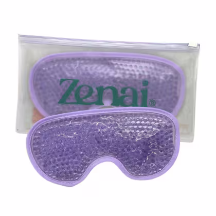 Embalagem plástica transparente contendo uma máscara de gel de resfriamento com textura de bolhas e logotipo "Zenai" em verde e roxo.