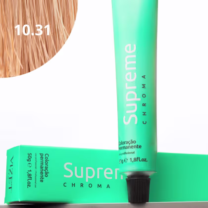 A imagem mostra a embalagem em tubo plástico verde claro com o nome da marca e produto impresso. Caixa retangular verde com detalhes do produto, incluindo a cor e o volume de 50g. No canto superior há uma pequena mecha com o tom da coloração.