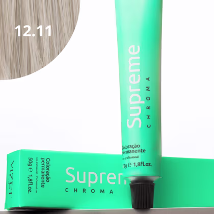 A imagem mostra a embalagem em tubo plástico verde claro com o nome da marca e produto impresso. Caixa retangular verde com detalhes do produto, incluindo a cor e o volume de 50g. No canto superior há uma pequena mecha com o tom da coloração.