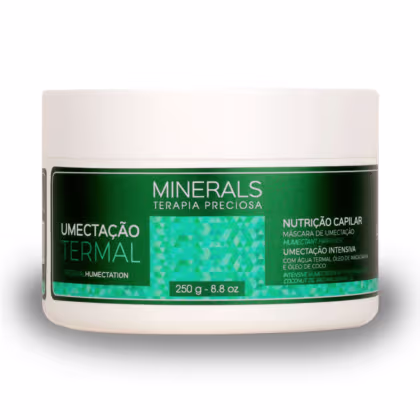 A imagem traz a máscara de tratamento da linha Minerals Terapia Preciosa Umectação Capilar. O produto vem em um pote de 250g feito de plástico branco com rótulo verde, e promete umectação intensiva aos fios.