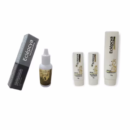 A imagem mostra uma linha de produtos de maquiagem da marca Eclépcya. Há um frasco contendo um oxidante, outro uma coloração e três pequenos tubos com uma fórmula para sobrancelhas, sendo dois deles para alinhamento e um sérum para sobrancelhas.