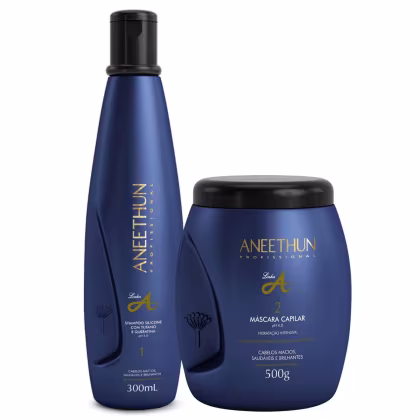 Shampoo 300ml e máscara 500g. Embalagens azul escuro com tampa preta e letras douradas.