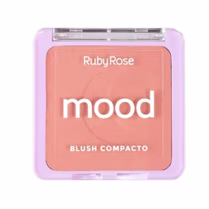Blush compacto da marca Ruby Rose, com a palavra "mood" destacada em grande texto na embalagem. A embalagem é de plástico transparente com uma cor de fundo rosa claro. O blush em si possui uma tonalidade laranja-rosada.