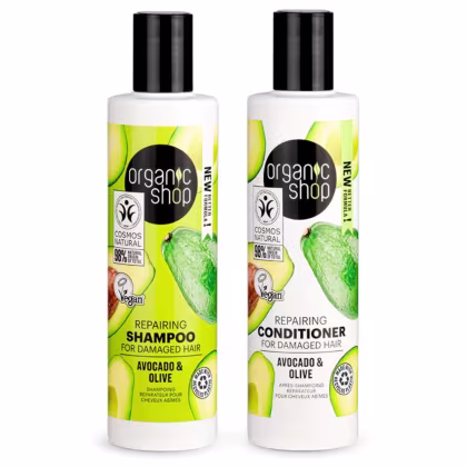 A imagem mostra um shampoo e condicionador em frascos brancos com tampa preta. O rótulo do shampoo é verde e traz abacates estampados. O frasco do condicionador é branco e também traz abacates estampados.