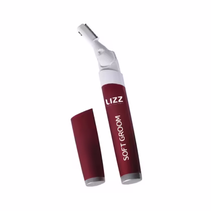 Aparelho de beleza Lizz Professional com design moderno e compacto, em cores branca e vermelha, com o texto "Soft Groom" impresso no corpo do produto.