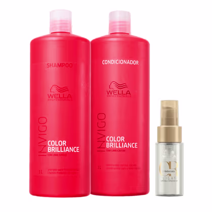 Conjunto de produtos Wella Professionals para cuidados com cabelos coloridos, incluindo shampoo, condicionador e um óleo capilar. As embalagens são vermelhas com o nome da linha "Invigo Color Brilliance" e o logotipo da marca Wella.