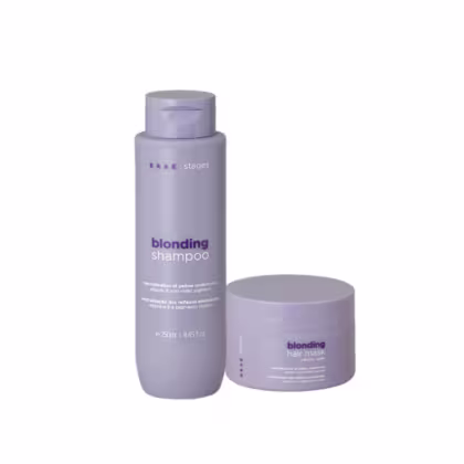 Dois produtos da linha Braé Stages: um frasco de shampoo e um pote de máscara capilar, ambos em tons de roxo, com rótulos indicando que são produtos para loiros.
