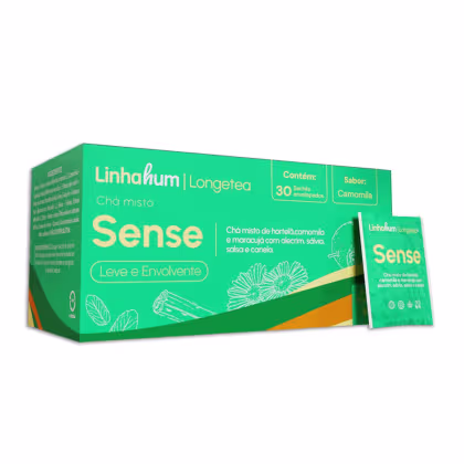 Caixa de chá misto da marca Linhahum, com o nome "Sense". A caixa é verde e contém 30 sachês de chá com sabor de camomila. O texto na embalagem indica que o chá é uma mistura de ervas, incluindo hortelã, camomila, maracujá, alecrim, sálvia e canela.